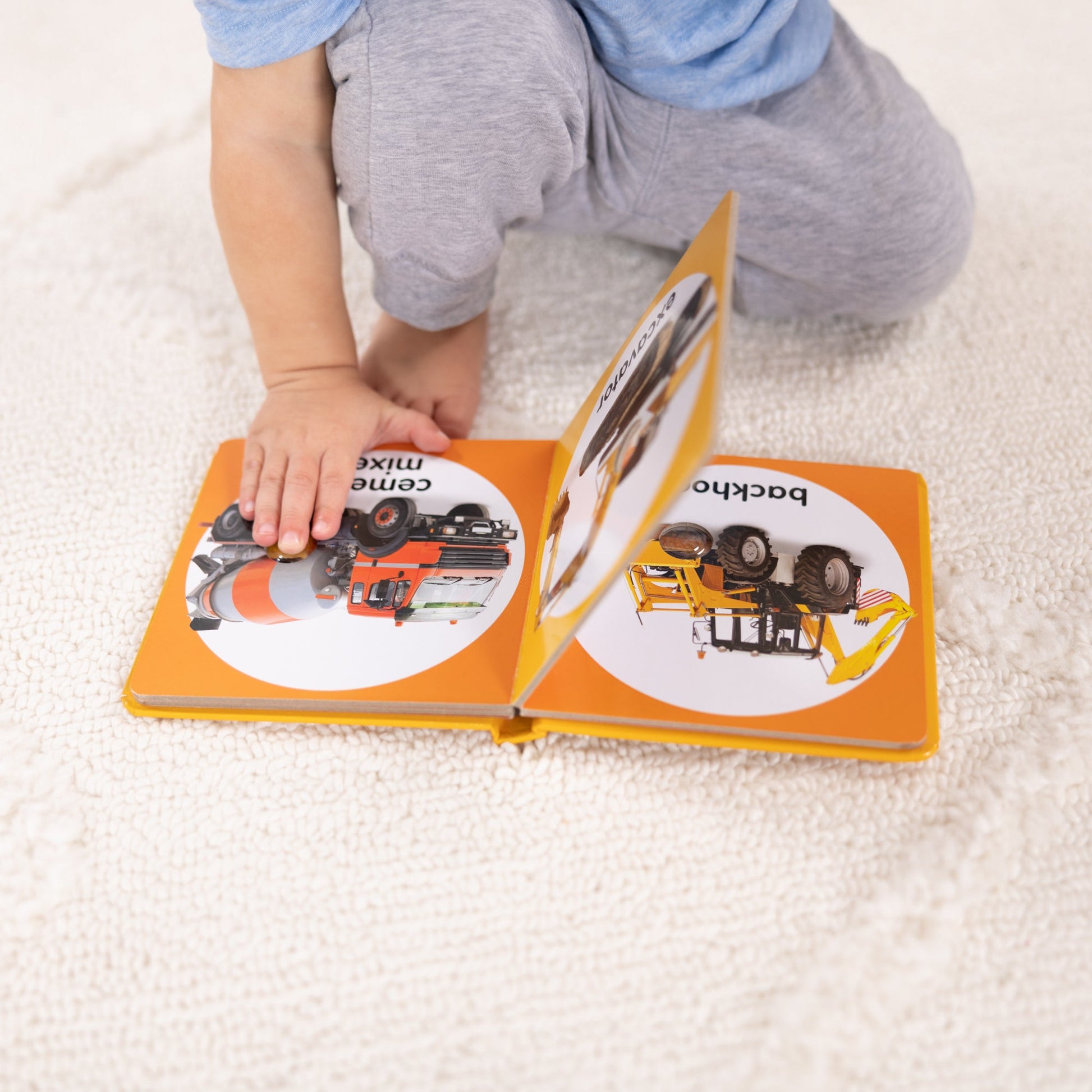 Poke-a-Dot: Construction Vehicles Board Book